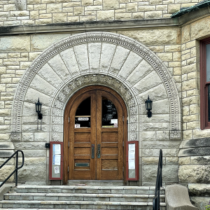 Archway of Adams Memorial Library, carved by Wheaton artisan